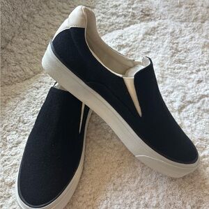Black Slip-On Women's Sneakers with White Accents